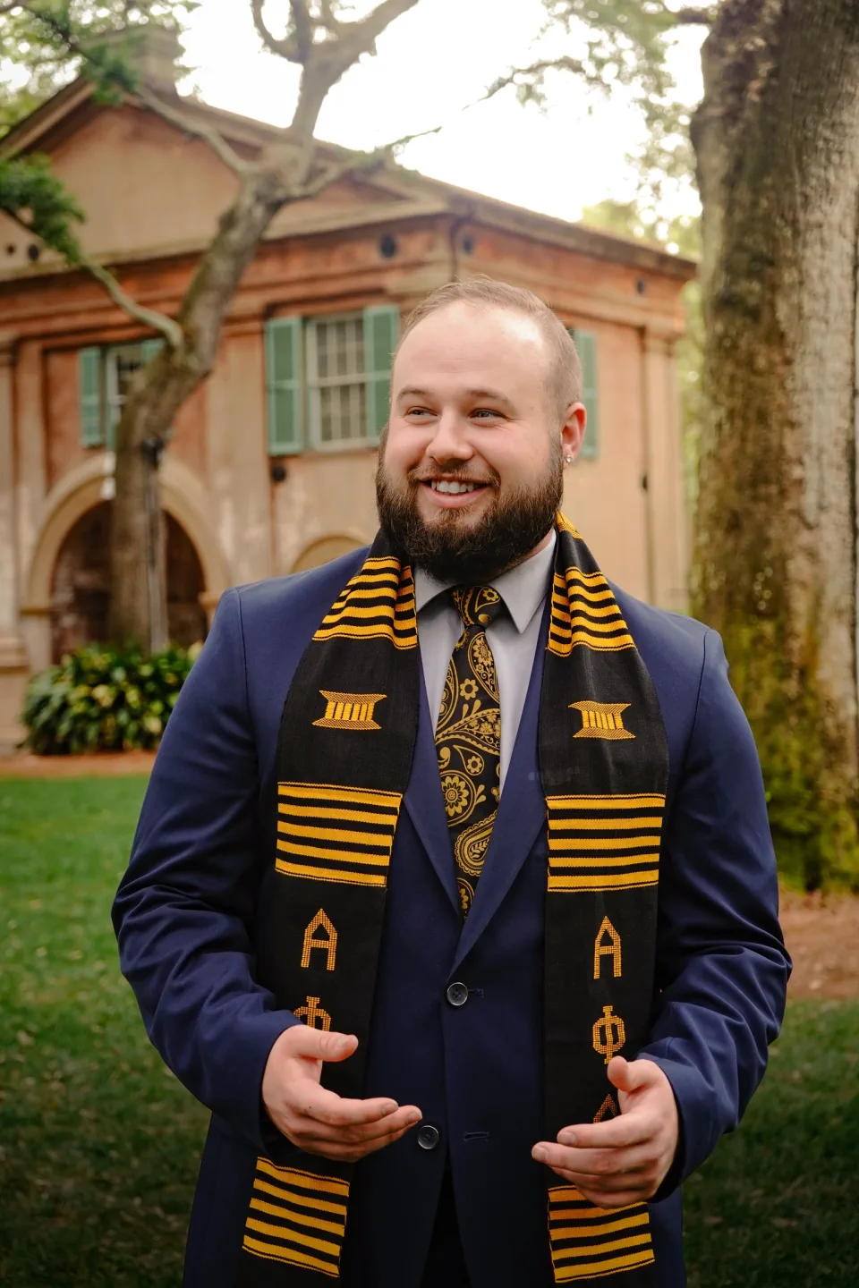 College of Charleston graduation photographer capturing cap and gown portraits in Charleston SC