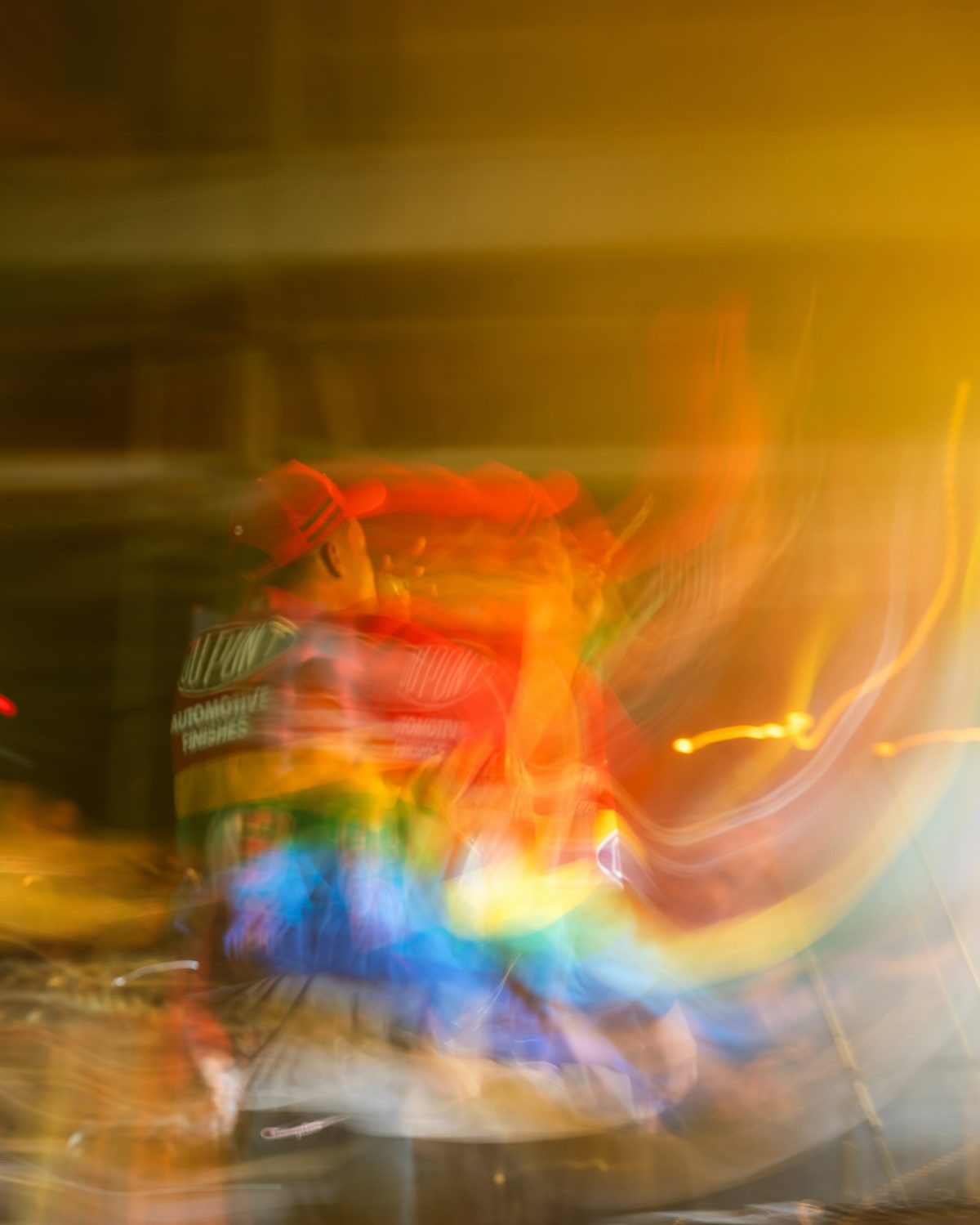 Shutter drag creative portrait with neon light trails and motion blur in Charleston bar by Joshua Smith photographer