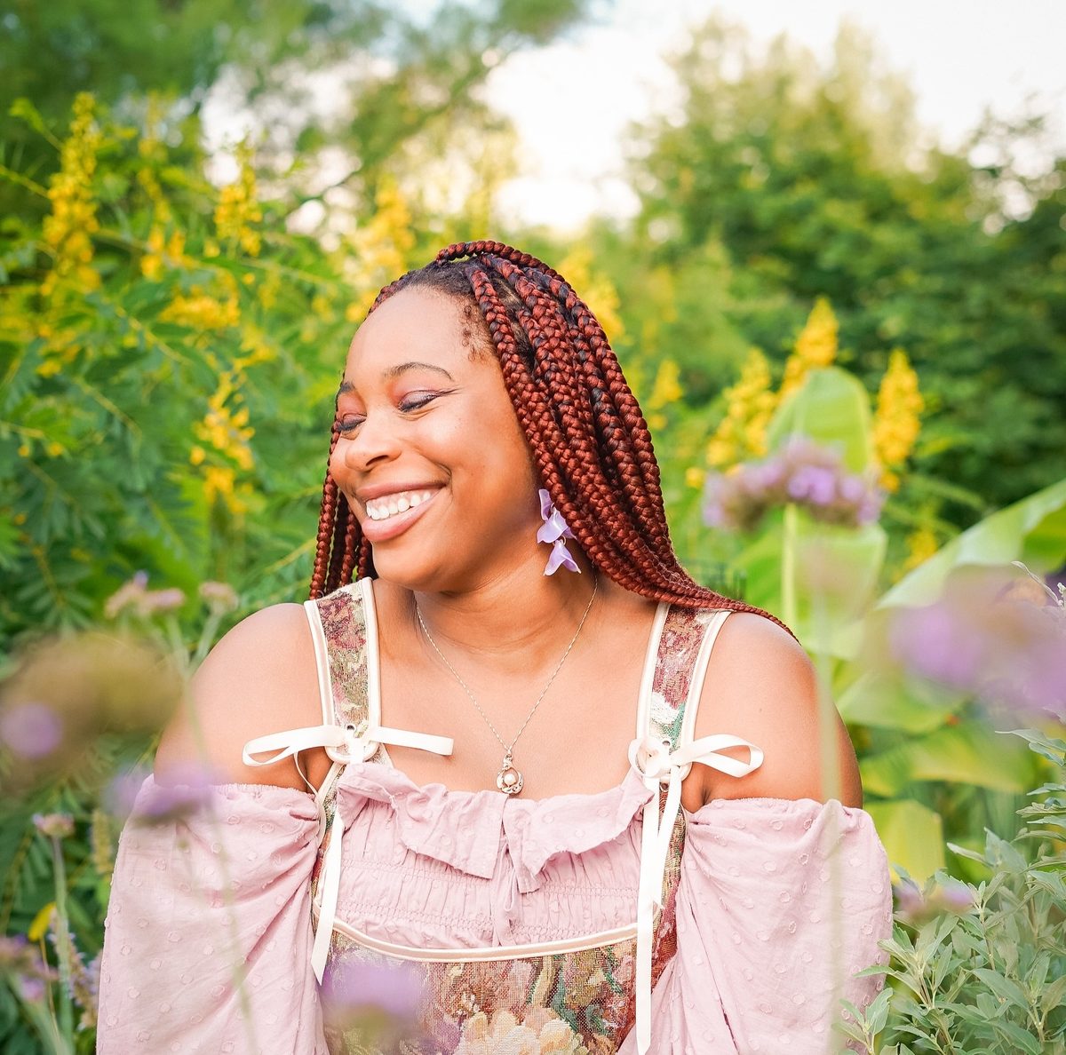 Fairy core portrait photography in a Baltimore garden - flowing fabrics and natural greenery photographed by Joshua Smith